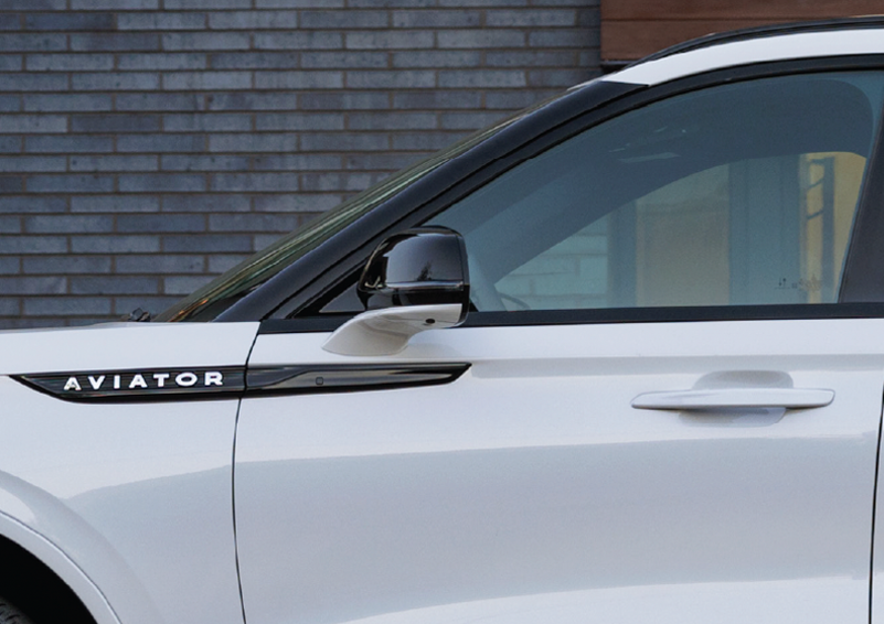 The driver’s door of a white 2025 Lincoln Aviator® SUV is showcased. | Stuteville Lincoln of Ponca City in Ponca City OK